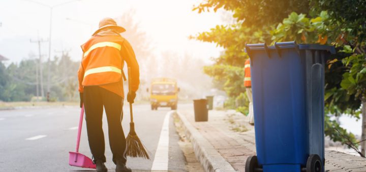 worker cleaning the road